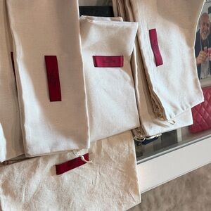 Valentino Garavani Red and Cream Canvas Bags/Christian Louboutin red felt bags.